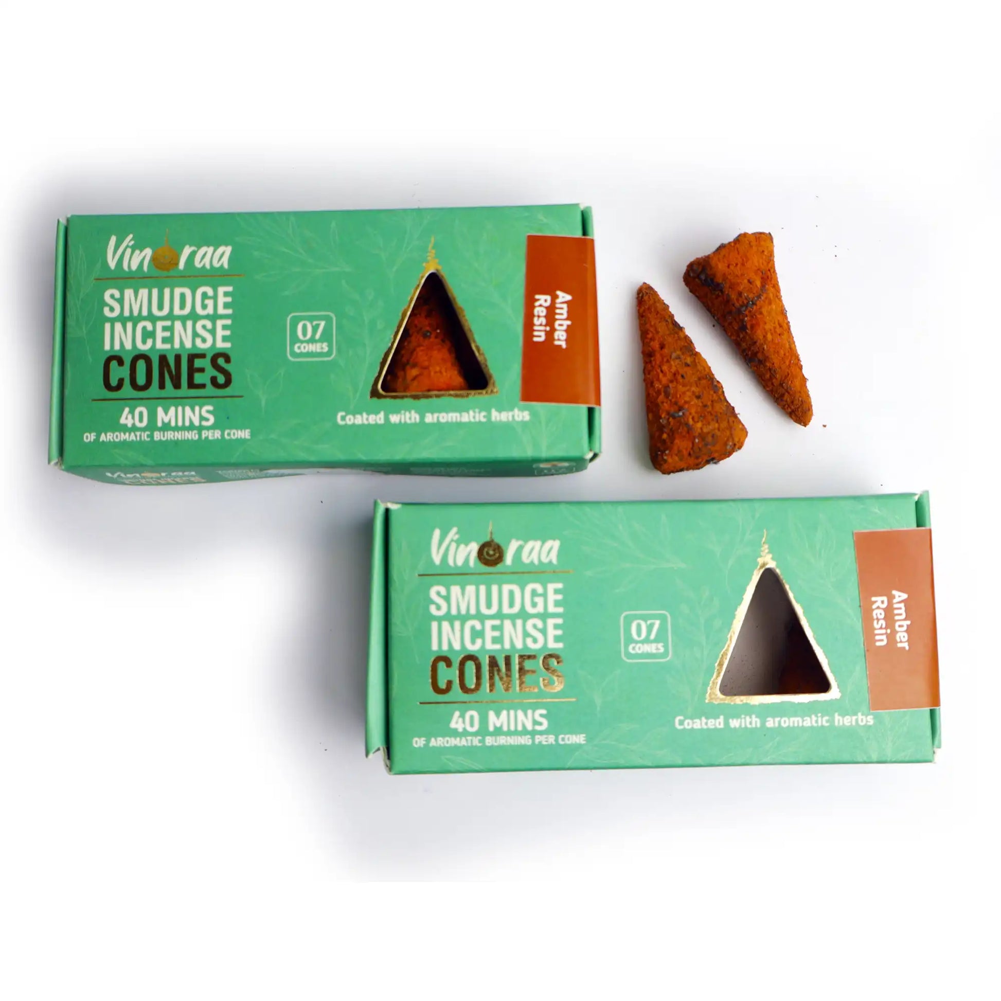 Amber resin incense cones burning