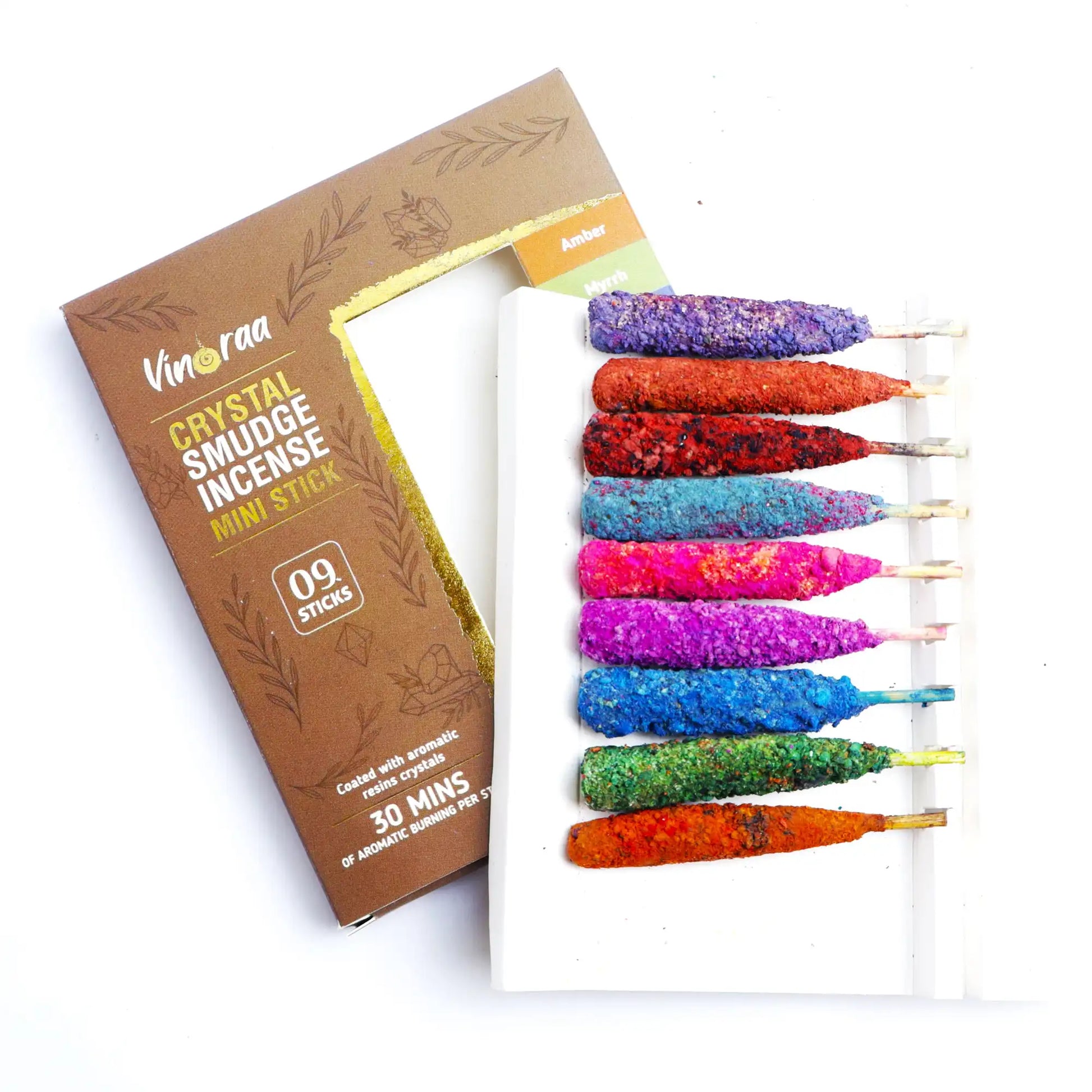 Mini incense sticks burning with aromatic smoke